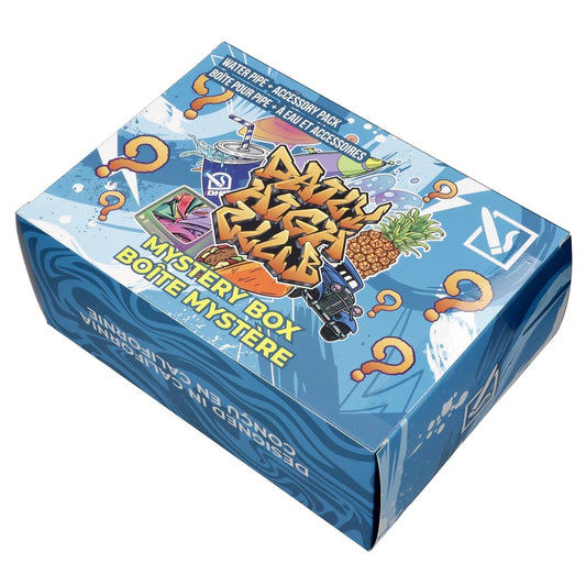 The DHC - Mystery Box - Abominable, light blue, is shown in a high-angle shot with bold graphics on its packaging.