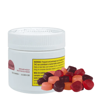 Close-up shot of Orchard Medley Gummies in a clear plastic bag with a vibrant, colorful assortment of gummies visible inside.