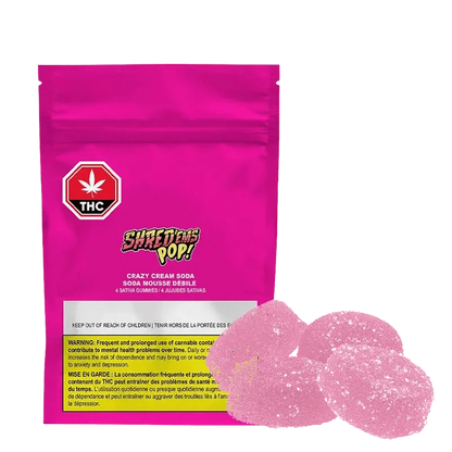 Close-up of the Crazy Cream Soda Cookies Gummies packaging with a colorful design and prominent branding on a dark background.