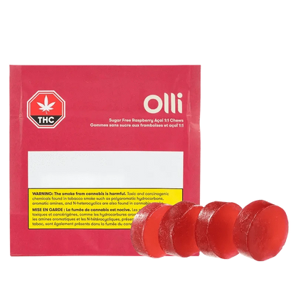 A close-up of Sugar Free Raspberry Acai 1:1 Gummies against a dark background with prominent branding details.