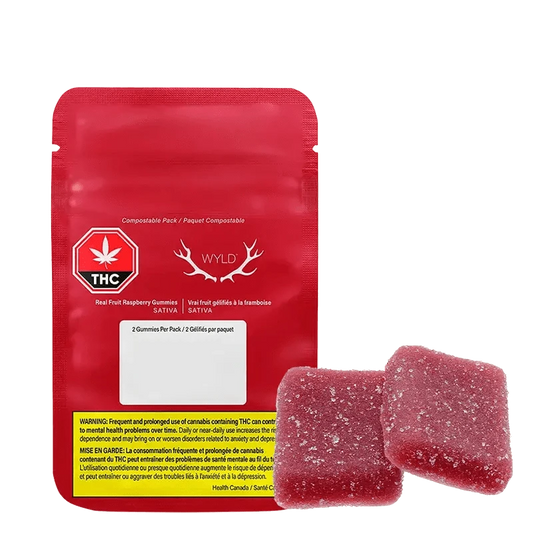 Front view of the Real Fruit Raspberry Gummies package featuring a green logo and text on a black background.