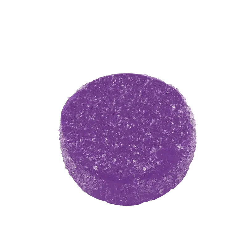 Close-up of Sweet Dreams Goji Berry Gummies, showcasing their round shape against a plain white background.