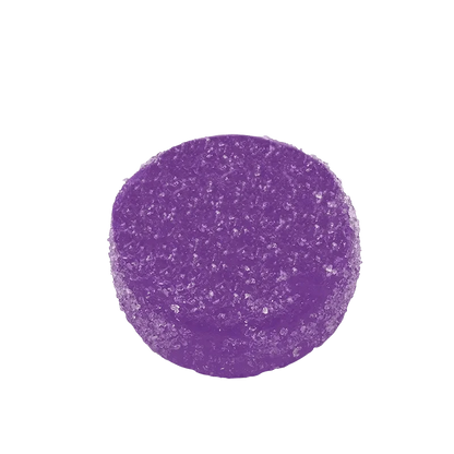 Close-up of Sweet Dreams Goji Berry Gummies, showcasing their round shape against a plain white background.