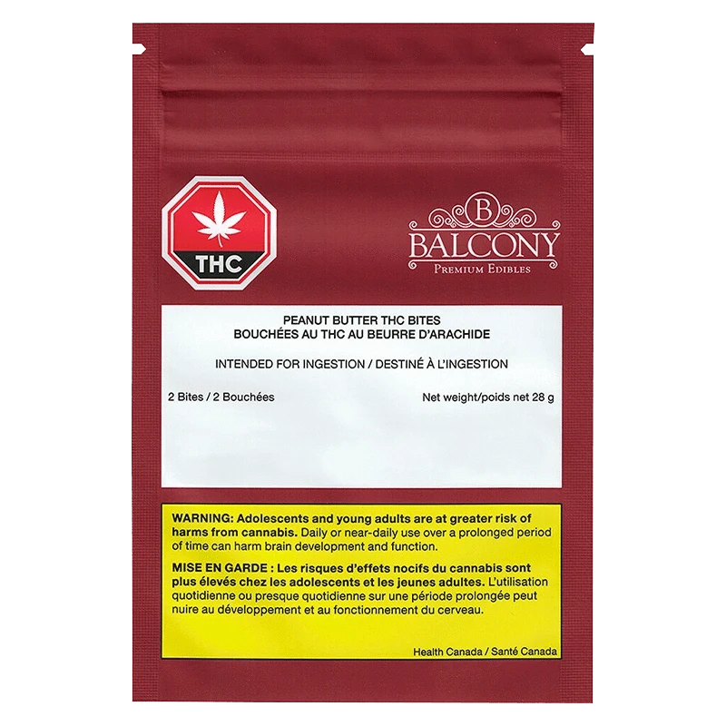A close-up of the Balcony Peanut Butter Bite packaging, displaying warning text on a white background.