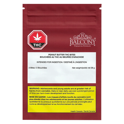 A close-up of the Balcony Peanut Butter Bite packaging, displaying warning text on a white background.