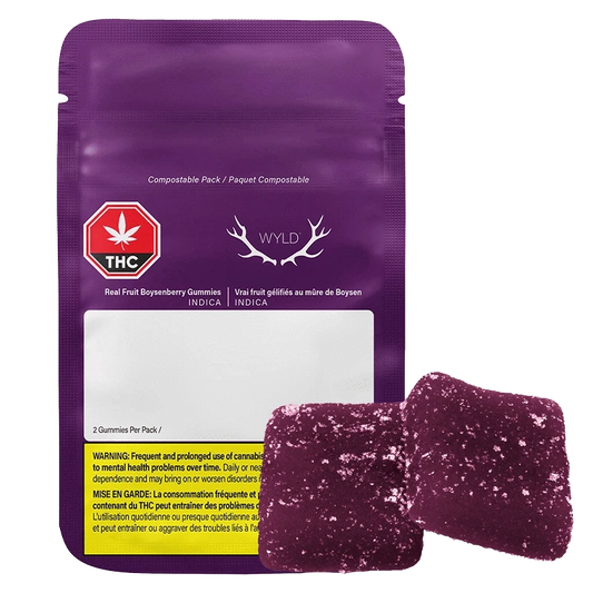 Real Fruit Boysenberry 2:1:1 CBD:THC:CBN Gummies packaging shown in a close-up, angled shot with a dark background and prominent branding.
