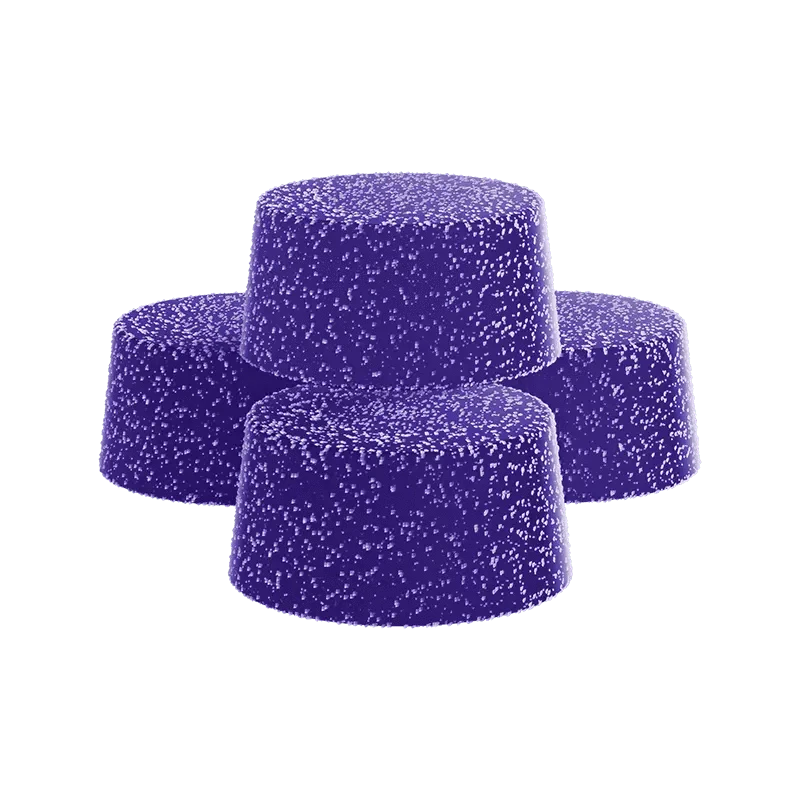 Overhead view of Dreamsicle Gummies, a cluster of colorful, rounded candies against a plain white background.
