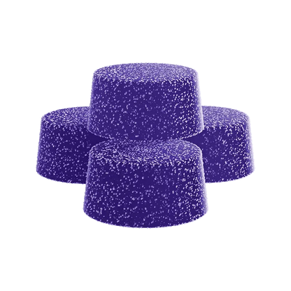 Overhead view of Dreamsicle Gummies, a cluster of colorful, rounded candies against a plain white background.