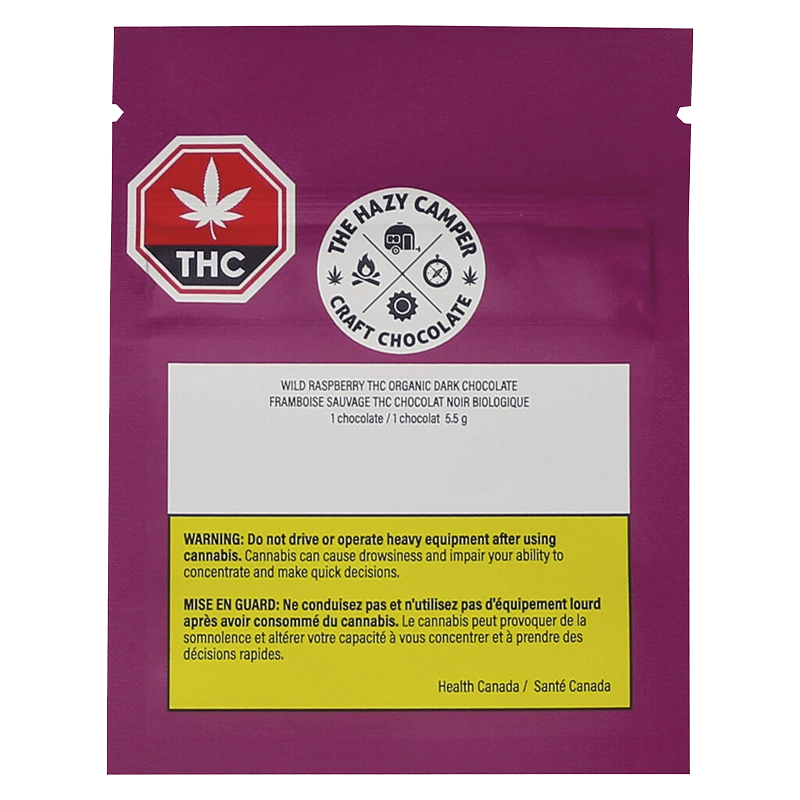 Close-up of the Wild Raspberry Thc Organic Dark Chocolate bar packaging with a red and white label, angled slightly to the right.