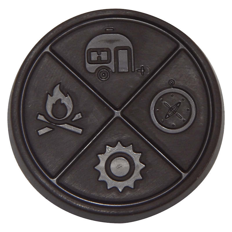 Overhead view of the Wild Raspberry Thc Organic Dark Chocolate, showing a circular dark-colored object with subtle textures.