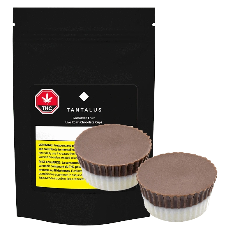 A close-up of the Forbidden Fruit Live Rosin Chocolate Cup against a black background, showing the product packaging.