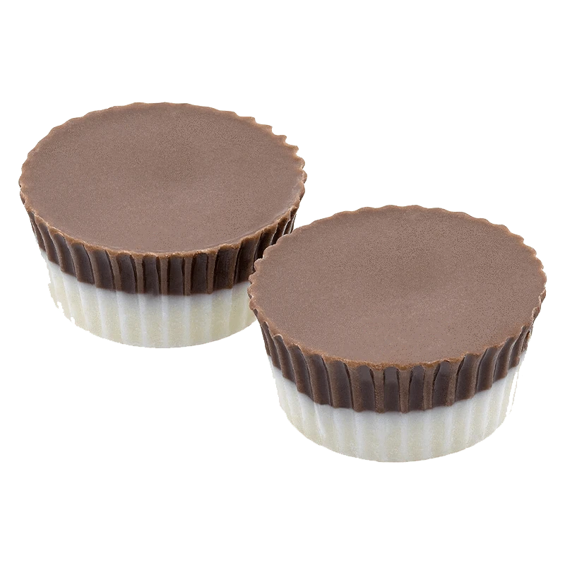 A studio shot of the Forbidden Fruit Live Rosin Chocolate Cup, showcasing its rounded, dark chocolate form on a pale surface.