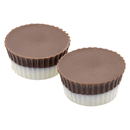 A studio shot of the Forbidden Fruit Live Rosin Chocolate Cup, showcasing its rounded, dark chocolate form on a pale surface.