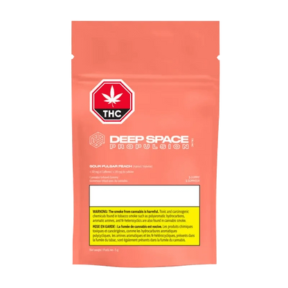 Front view of the Sour Pulsar Peach THC Caffeine Gummy packaging, displaying a colorful design and bold branding against a dark background.