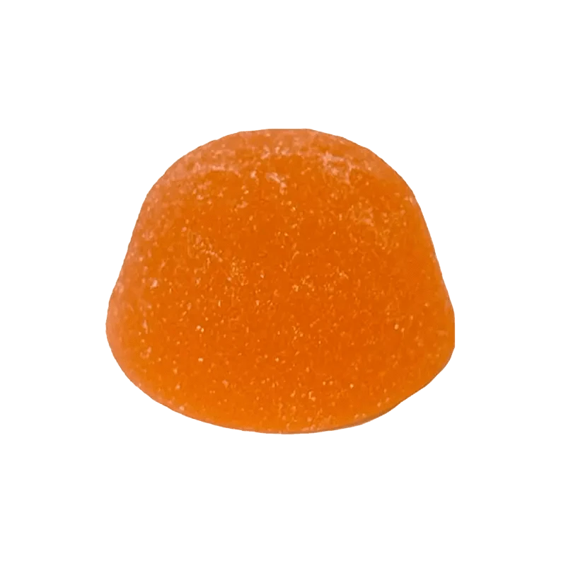 A close-up of the peach-colored Sour Pulsar Peach THC Caffeine Gummy, angled slightly against a plain white background.