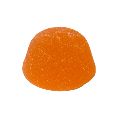 A close-up of the peach-colored Sour Pulsar Peach THC Caffeine Gummy, angled slightly against a plain white background.