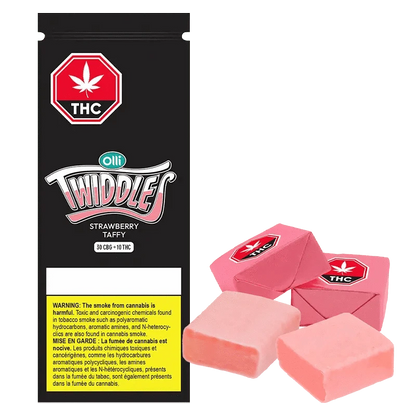 A close-up of 3:1 Original Strawberry Taffy CBG/THC Gummies packaging, featuring a pink and green color scheme, angled slightly to the left.