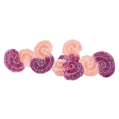 Overhead view of the Tropical Triple Berry 2:1 Gummies, showcasing the translucent, colorful gummy candies arranged on a white surface.