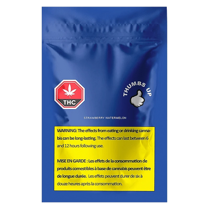 Front-facing shot of the Strawberry Watermelon Gummies pouch showing a blue resealable bag with THC and thumbs-up icons and a yellow warning panel.