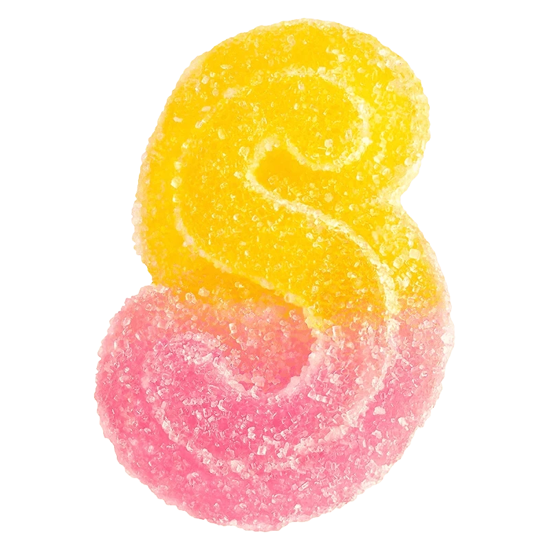 Close-up of a sugar-coated, two-tone pink and yellow gummy in an S-shape labeled Fully Blasted Pink Lemonade Gummies.