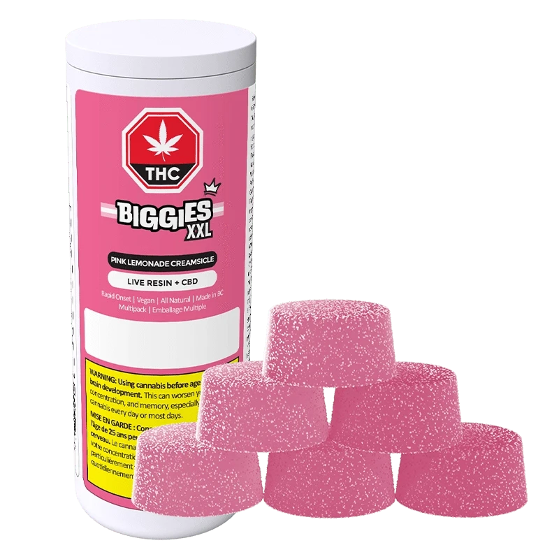 Front view of a pink-labeled Biggies XXL Pink Lemonade Creamsicle Live Resin THC:CBD Gummies 6 Pack container with six sugar-coated pink gummies stacked in front.