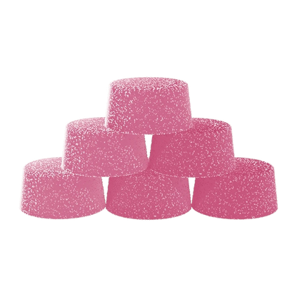 Stacked front view of six pink, sugar-coated Pink Lemonade Creamsicle Live Resin THC:CBD Gummies arranged like small rounded domes.