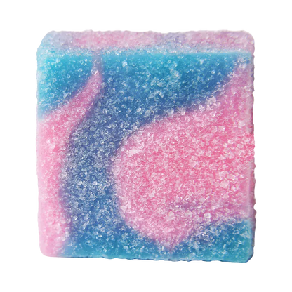 Top-down close-up of a sugar-coated square gummy showing swirls of pink and blue, labeled No.7 Distillate Delta 9-Cotton Candy.