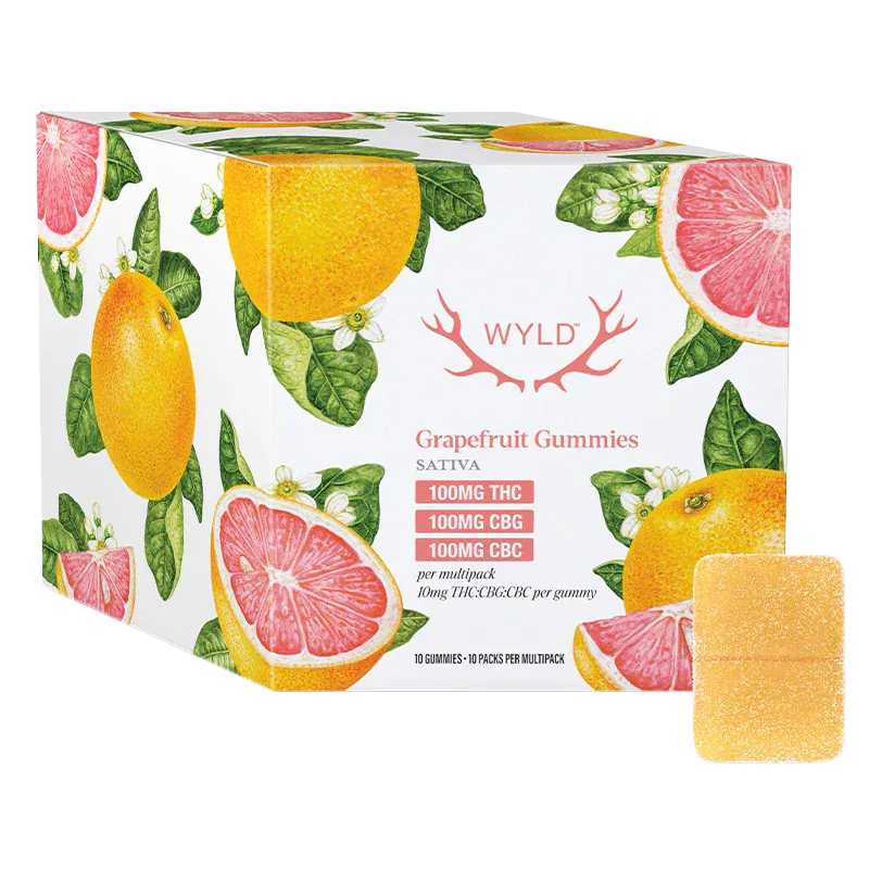 Three-quarter view of a Wyld Real Fruit Grapefruit 1:1:1 THC:CBG:CBC Gummies 10 pack box with grapefruit illustrations and a single sugar-coated gummy.
