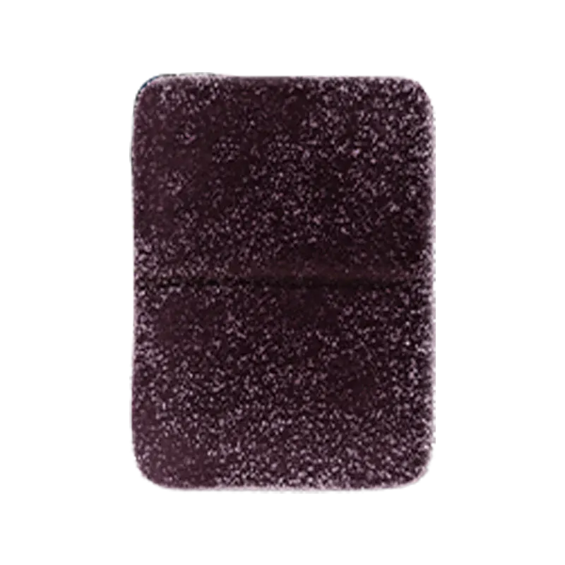 Top-down view of a single dark purple chew with sugar crystals, labeled Real Fruit Elderberry 2:1 THC:CBN Gummies.