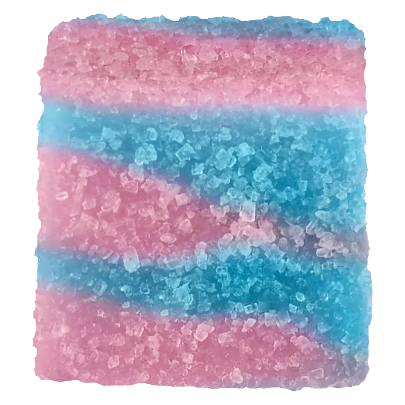 Close-up top view of a pink-and-blue sugar-coated cube of True Hybrid Rosin Blue Raspberry Cotton Clouds Gummies showing granular texture and layered swirls.