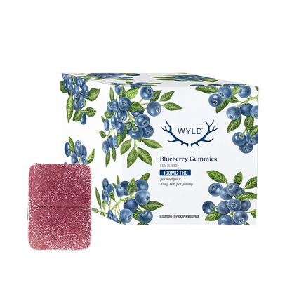 Angled box shot of the WYLD Blueberry THC Gummies 10 Pack with watercolor blueberry illustrations and a single sugar-coated square gummy in front