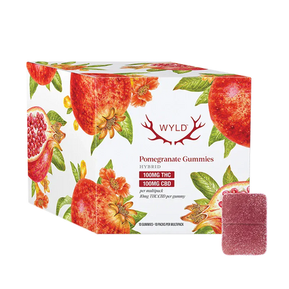 Angled front view of the WYLD Pomegranate 1:1 THC:CBD Gummies box with watercolor pomegranate illustrations and a sugar-coated square gummy beside it.