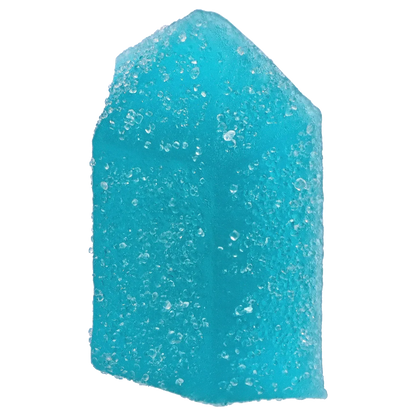 Close-up front view of a sugar-coated blue gummy from THC+CBN Blue Topaz Crystal Blue Raspberry Gummies, showing granular coating and bright teal color.