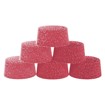 Stacked pyramid of six sugar-coated pink Raspberry Ginger Ale Live Resin Gummies shown from a low front angle against a white background.