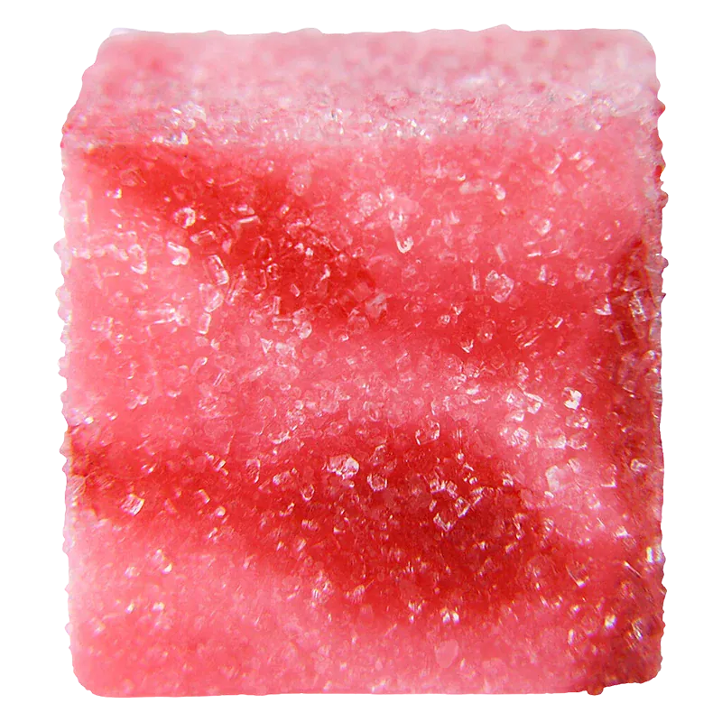 Top-down close-up of a sugar-coated pink cube candy, No. 24 True Hybrid Resin Sour Cherry, showing crystalline granules and subtle darker cherry swirls