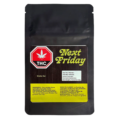 Front-facing shot of the black pouch labeled Next Friday Shatter Bar with a wood-grain label, red THC icon, and yellow warning block.