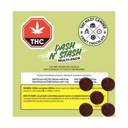 Top-down view of a green package labeled Hazy Mint THC Chocolates Dash N' Stash multi-pack with five round dark chocolate pieces arranged on the lower right.