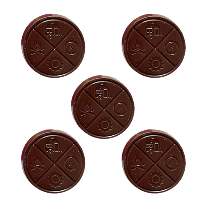 Top-down view of five round Hazy Mint THC Chocolates with stamped quadrant icons on a white background.