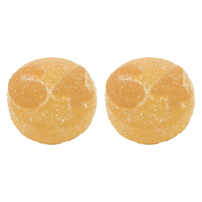 Top-down close-up of two sugar-coated orange rounds of THC-V: THC Orange Creams'cle Live Rosin Gummies against a white background.