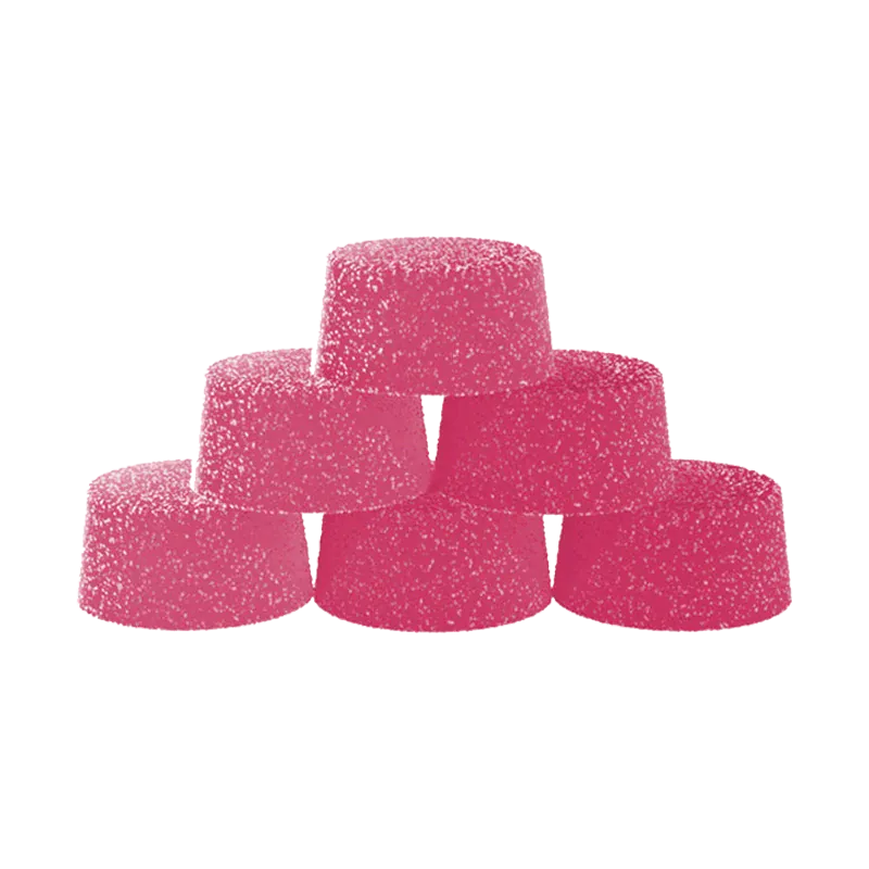 Stacked pyramid of six bright pink Dragon Fruit Creamsicle Gummies coated in sugar against a white background.