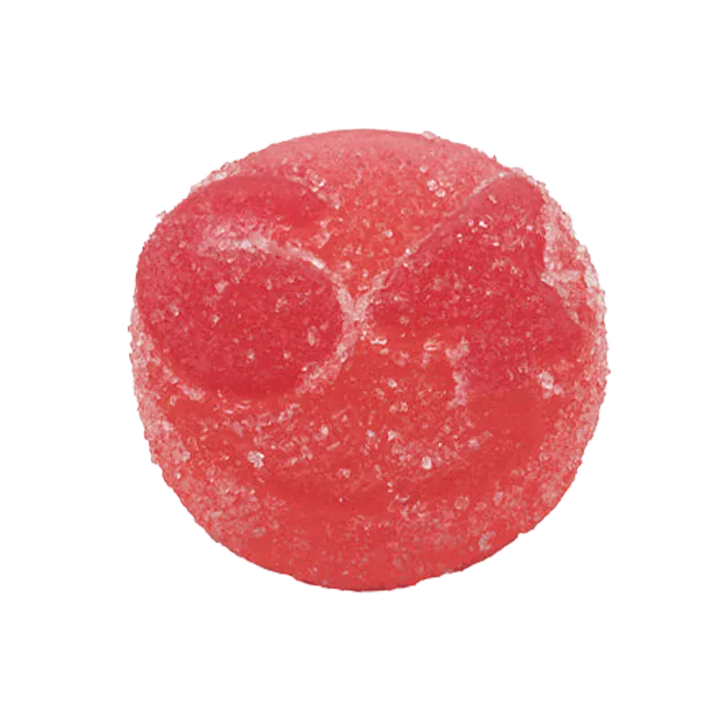 Top-down close-up of a sugar-coated red gummy, Strawberry Watermelon Live Rosin THC Gummies, showing textured surface and subtle circular indentations