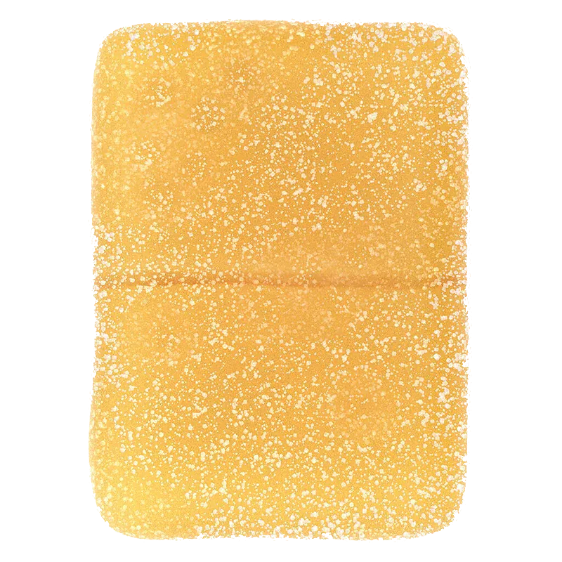 Close-up top-down view of a sugar-coated, rectangular yellow grapefruit gummy for Real Fruit Grapefruit Gummies.