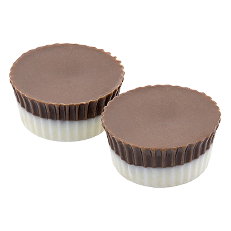 Top-down view of two Hash Rosin Chocolate Cups with smooth brown tops and white ridged bases set on a white background