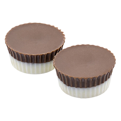 Top-down view of two Hash Rosin Chocolate Cups with smooth brown tops and white ridged bases set on a white background