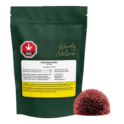 Front view of a green pouch labeled Woody Nelson Rainbow Driver Cured Resin Gummies with a single sugar-coated red gummy placed in front.