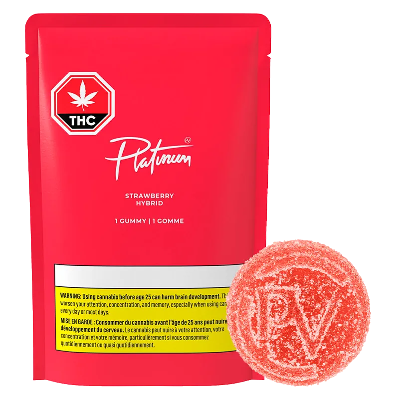 Front view of a red Platinum Strawberry Gummies pouch with white logo and a sugar-coated round strawberry gummy beside it.