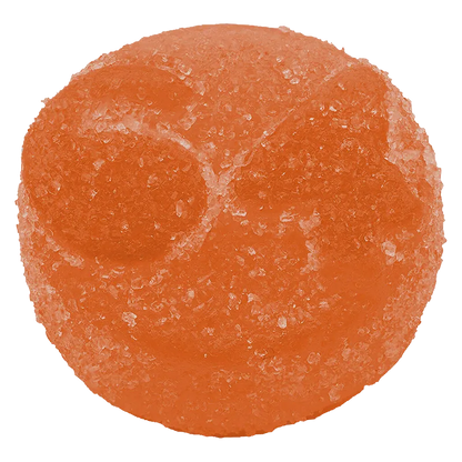 Close-up top view of an orange, sugar-coated gummy showcasing texture and two shallow circular indents, Fzy Peach THC:CBG Live Rosin Gummies