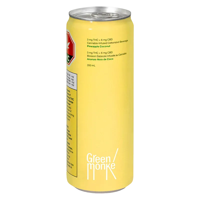 Tall, front-facing shot of the 350 ml Green Monke Pineapple Coconut can on a white background, showing its yellow label and silver top.