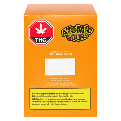 Back-facing view of the orange Foggy Peaches box showing THC symbol, Atomic Sours logo, and warning label.