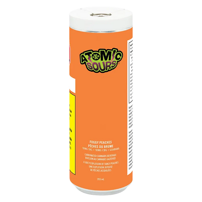 Center-front view of the tall orange Atomic Sours Foggy Peaches can showing the logo near the top and product text down the middle.